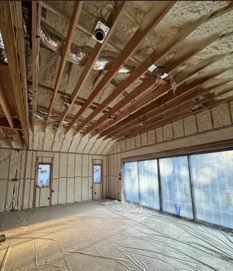 Interior walls and ceiling insulated with spray foam during new construction in Spring Grove